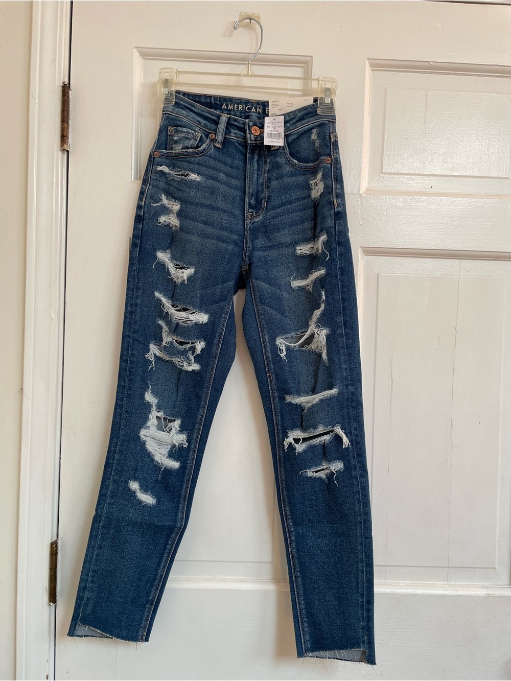 Brand new 
American Eagle Outfitters Women's Ripped Skinny Jeans - Dark Blue